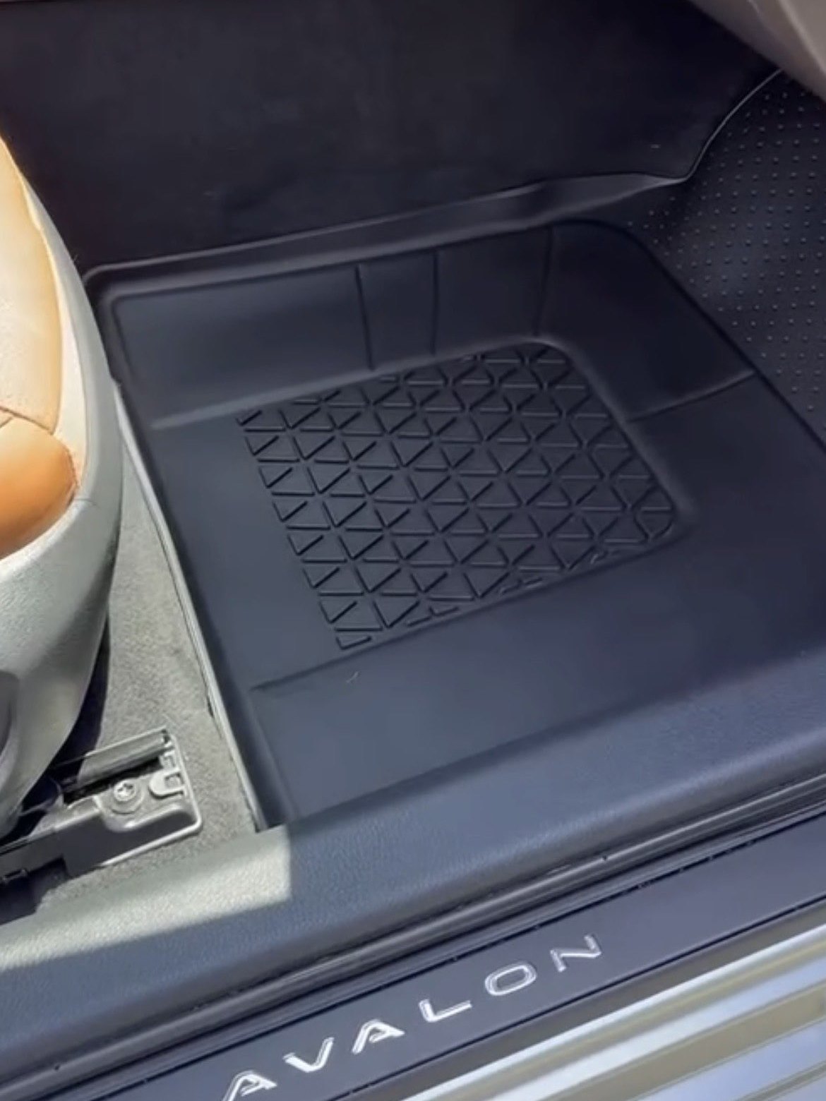 Cleaned front driver footwell and door sill on a Toyota Avalon — WashWrld mobile detailing, Woodstock GA